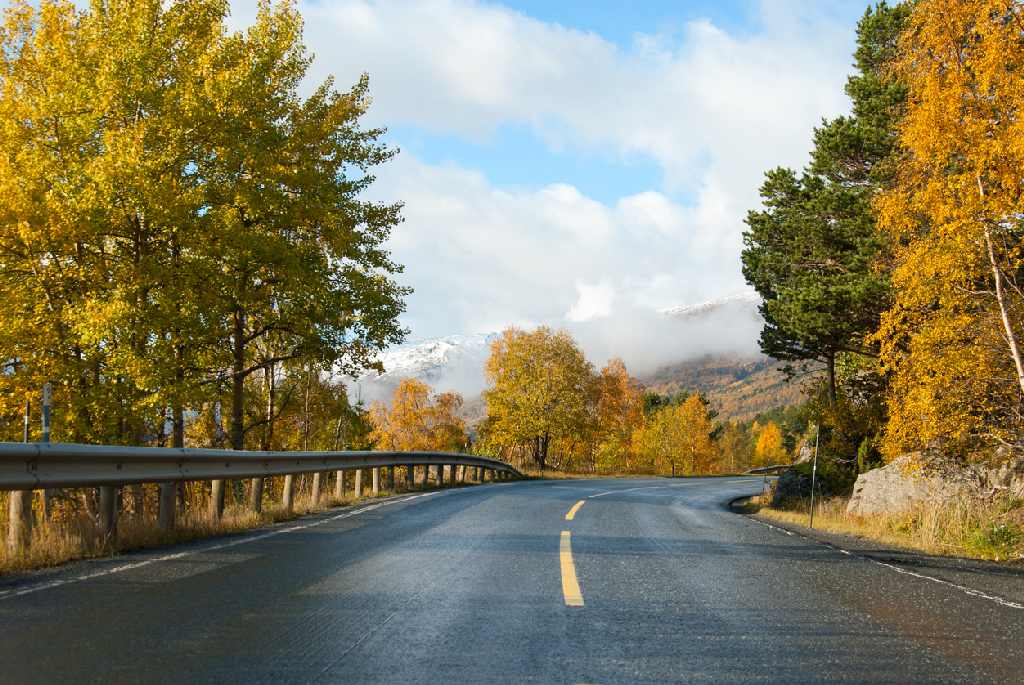 Quiet Scottish Highland road during the autumn shoulder season