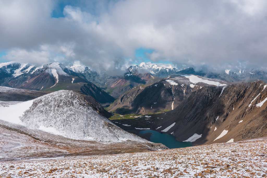 Snow-covered mountains and glen in the Scottish Highlands during winter