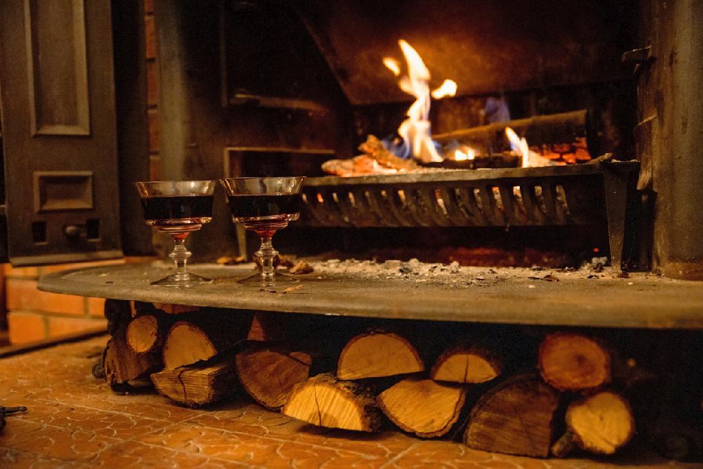 Traditional Scottish Highland pub with a warm fireplace during winter